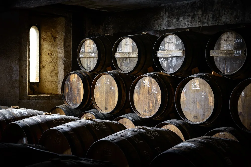 Barrels, barrels and casks in an ageing cellar where cognac eaux-de-vie from the Delamain trading house in Jarnac are stored.