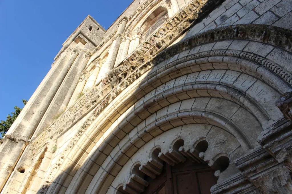 Romanesque porch of Saint Etienne abbey in the village of Bassac