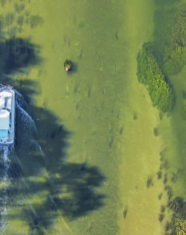 Barge on the Charente river seen from the sky